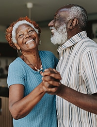 elderly couple dancing